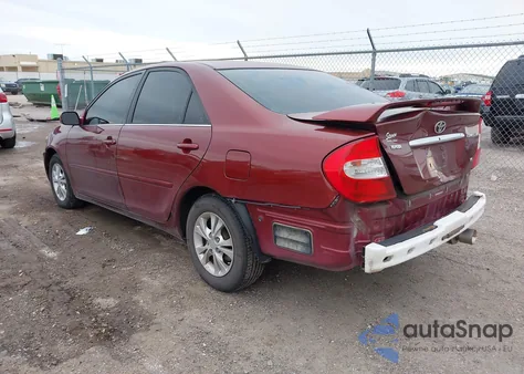 2004 Toyota Camry Le V6 z USA, uszkodzony, nr VIN 4T1BF32K64U077411